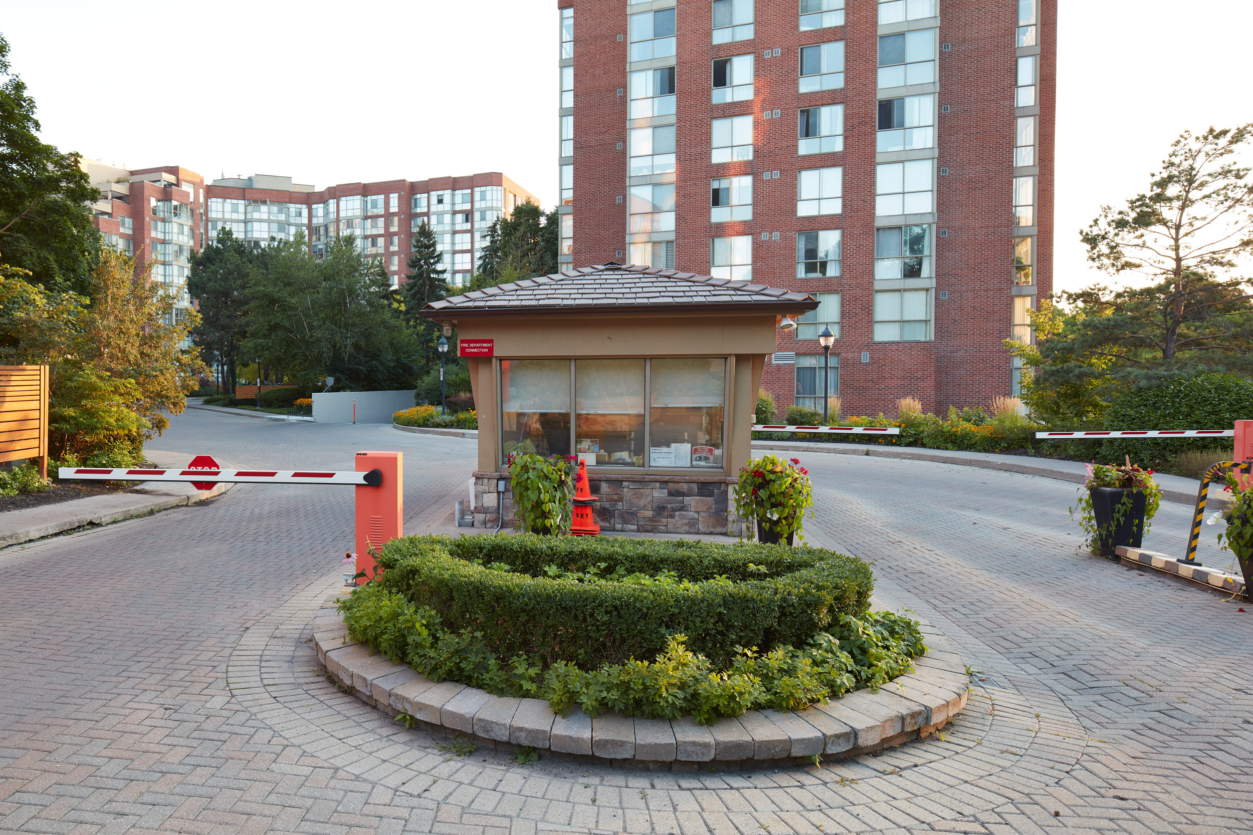 Property Gateway with stone flower bed