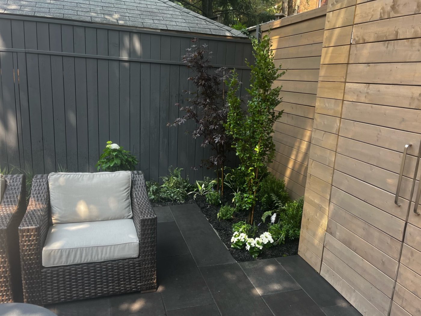 Built in Storage to backyard fence alongside stone patio