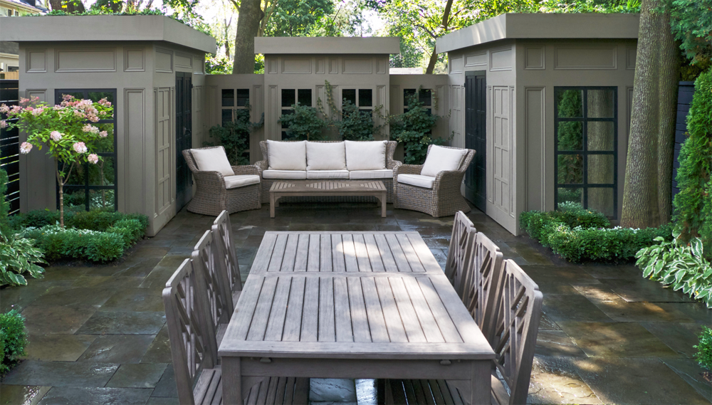 Outdoor dining table in aesthetic backyard