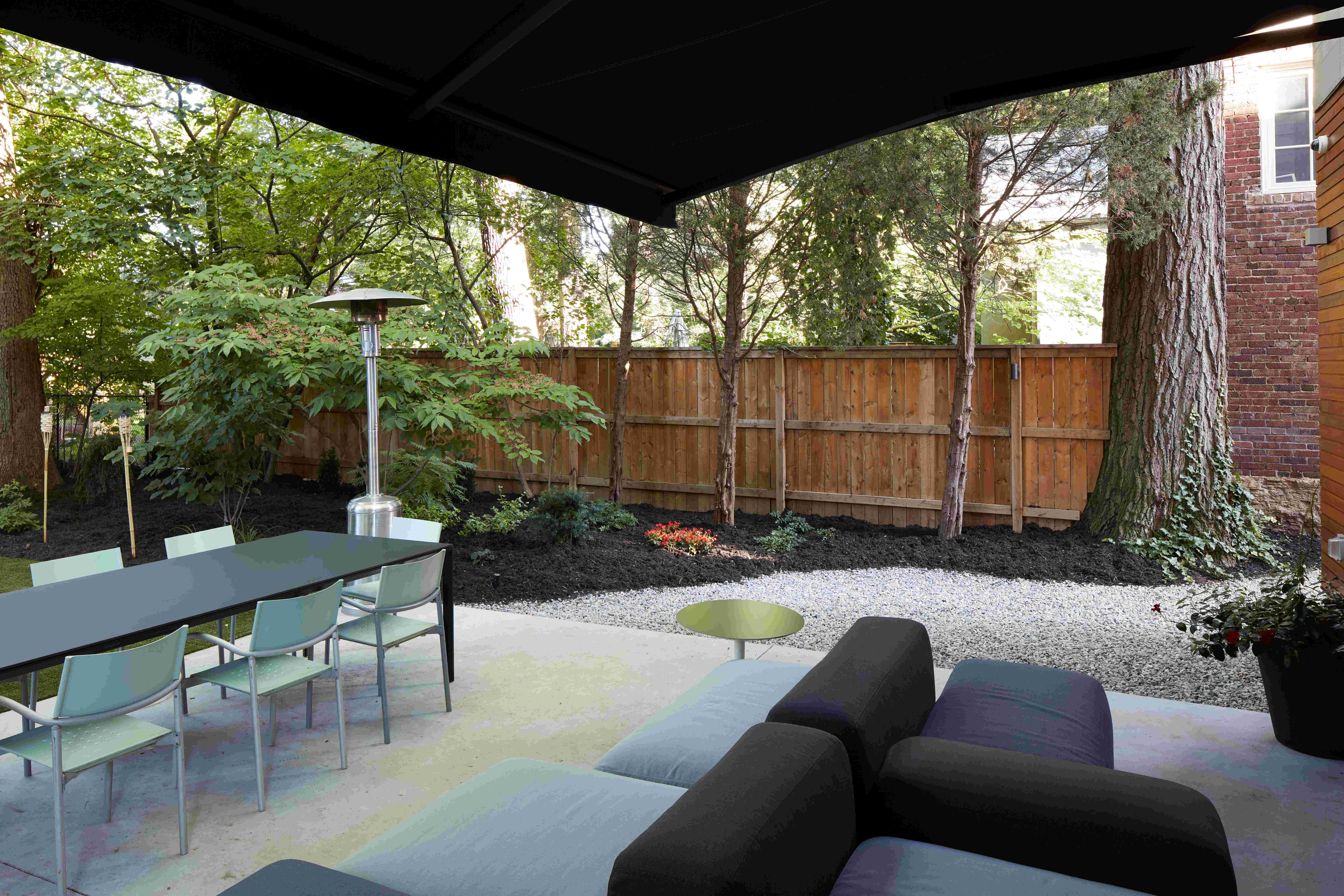 perfect backyard outdoor seating space with shade