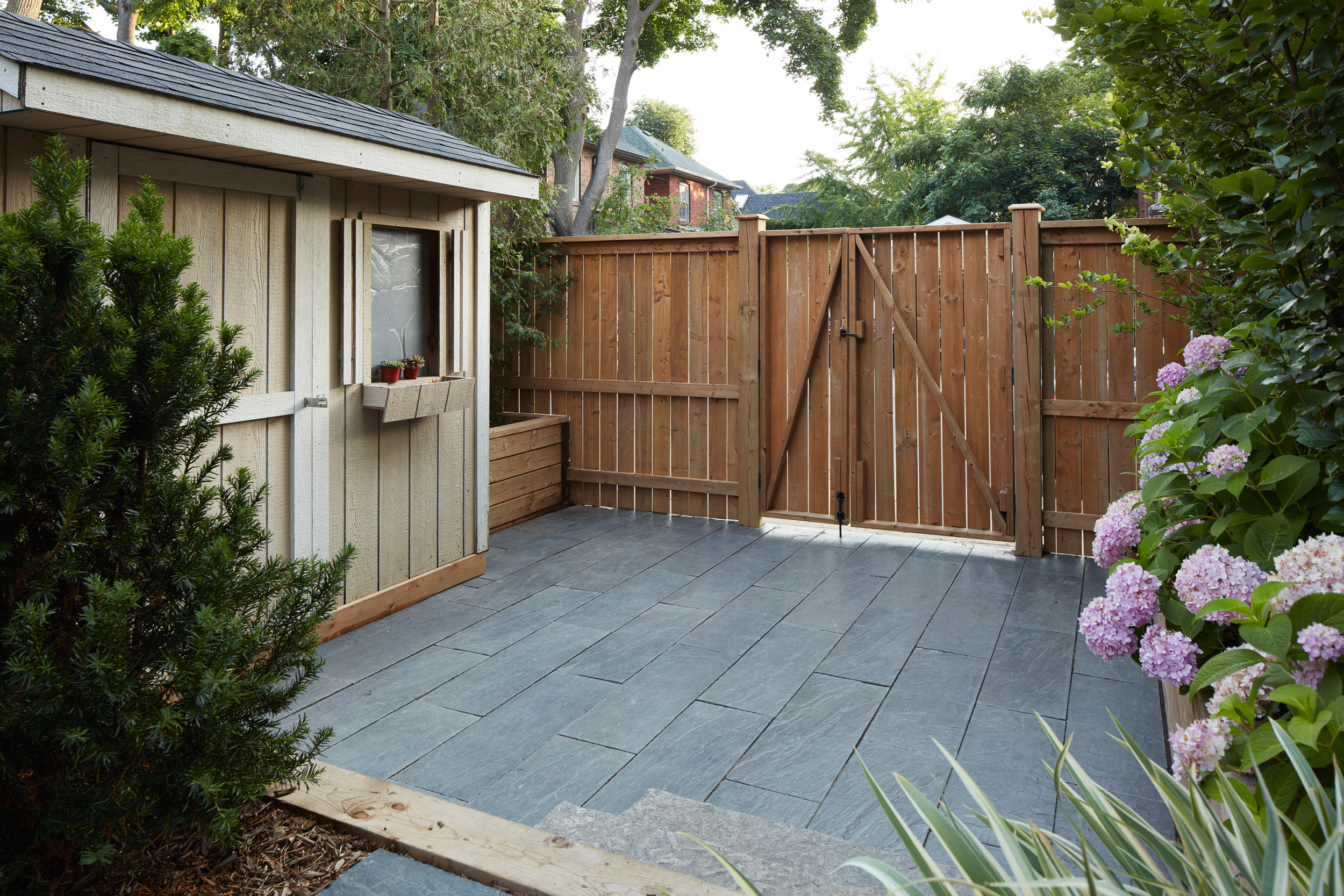 Back fence and gate with shed